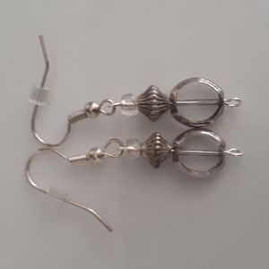 Beautiful handcrafted boho earrings .